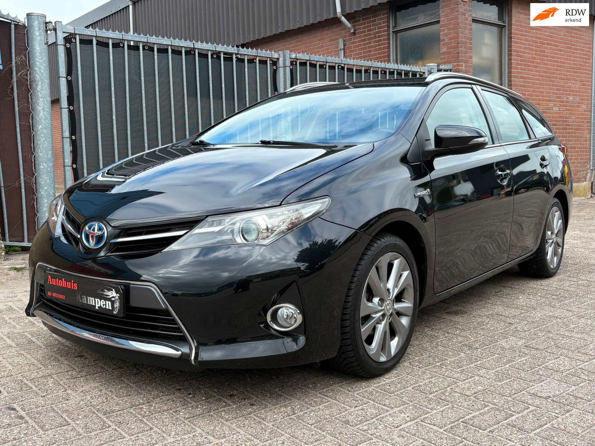 Toyota Auris Touring Sports 1.8 Hybrid Executive, Stof, Gebruikt, Zwart, 4 cilinders
