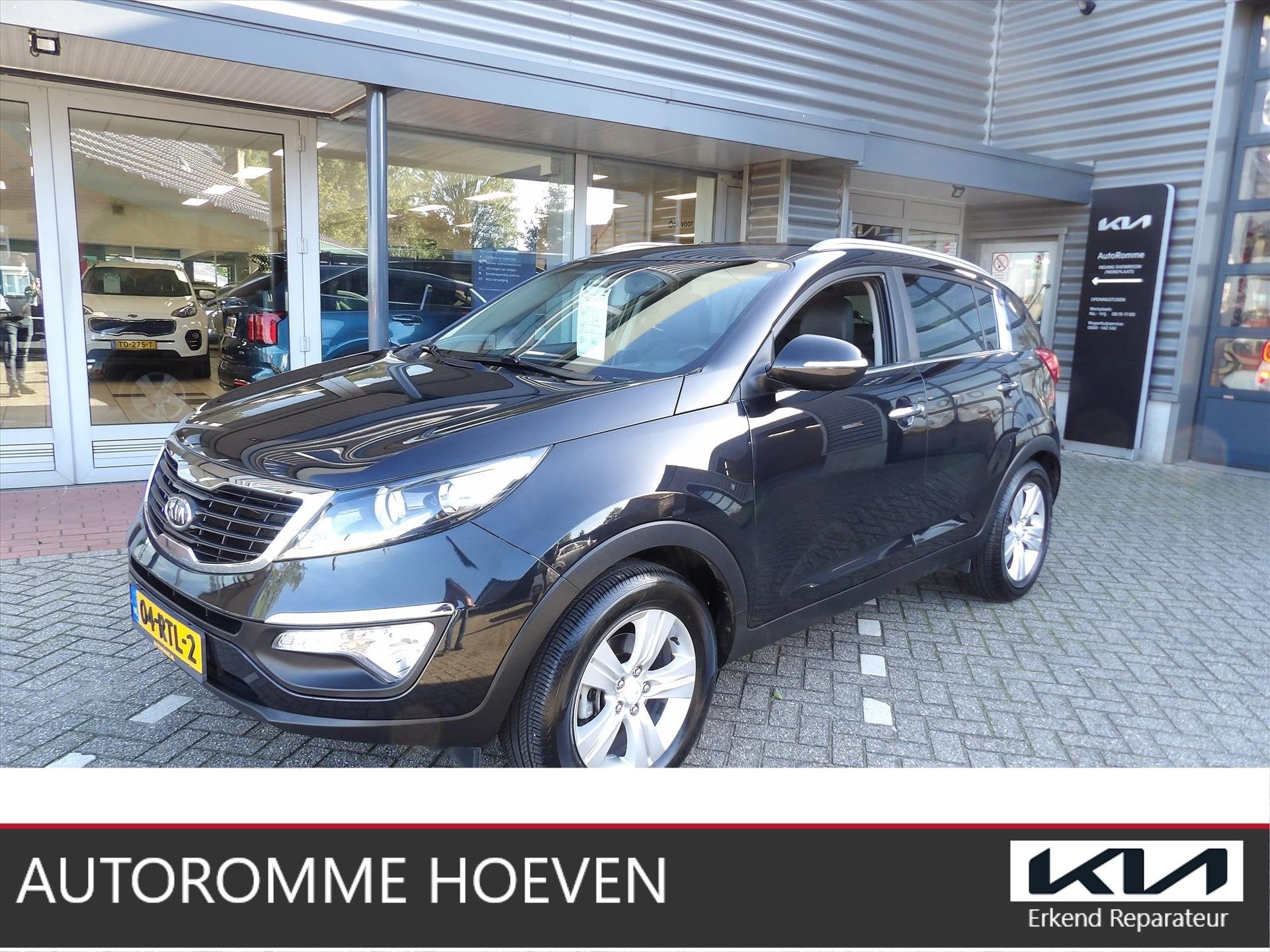 KIA Sportage 1.6 GDi X-ecutive Plus Pack Org. Ned dealer Ond, Auto's, 135 pk, 4 cilinders, Leder en Stof, Zwart