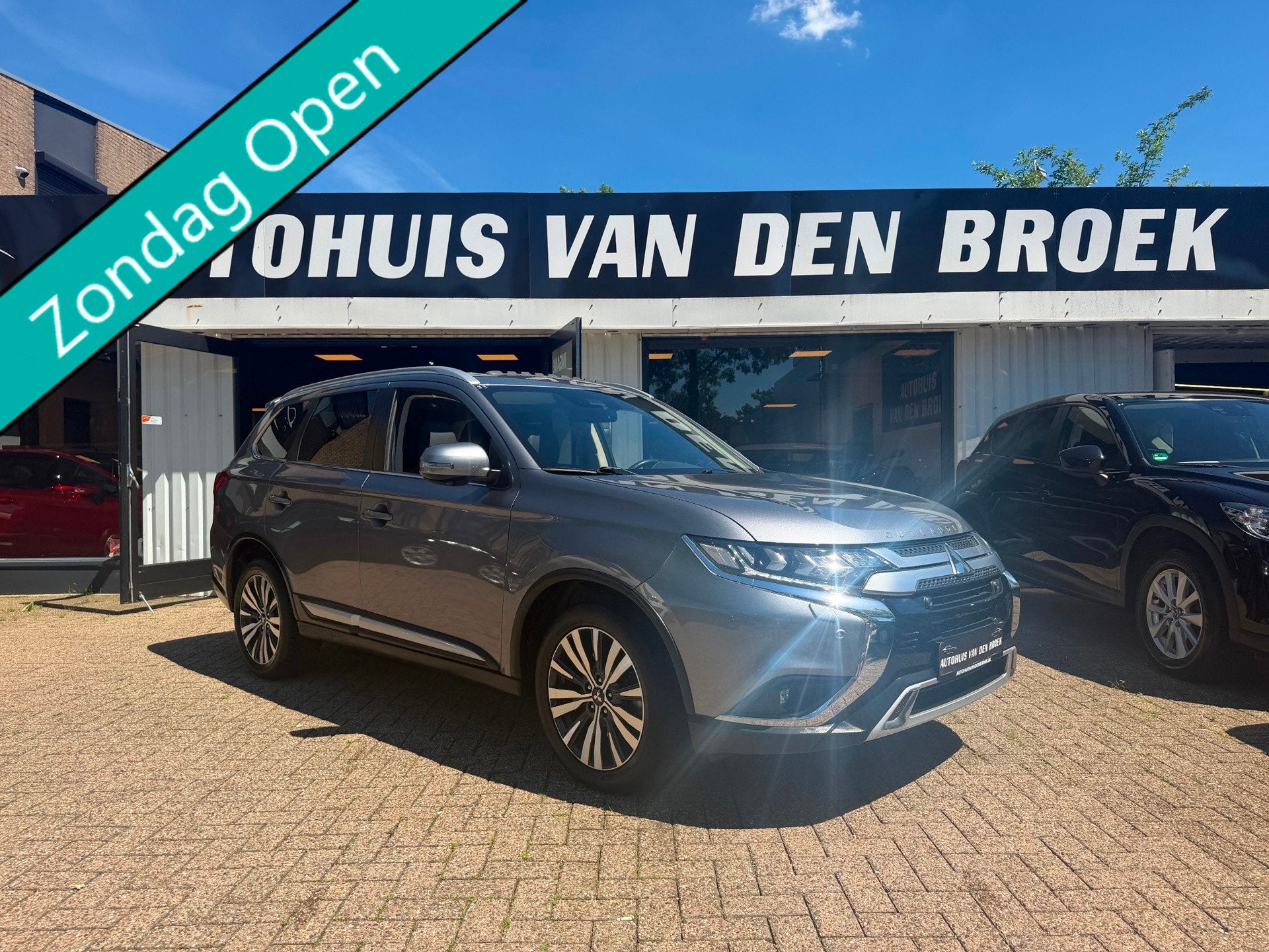 Mitsubishi Outlander 2.0 Instyle+ 4WD|7Pers|Automaat|Navi|Pa, Auto's, Zwart, 4 cilinders, 150 pk, 7 stoelen