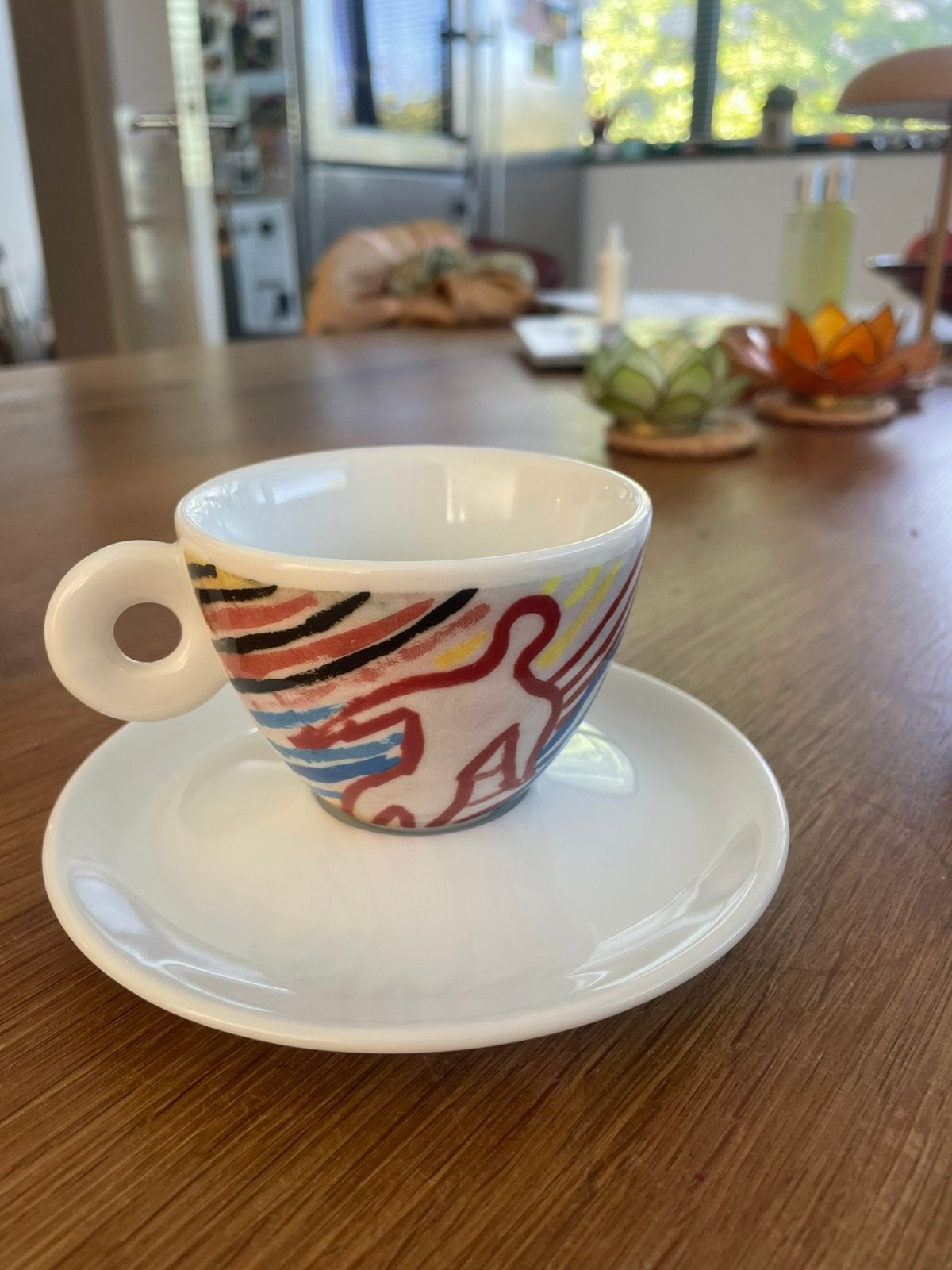 Illy kop en schotels, Ophalen