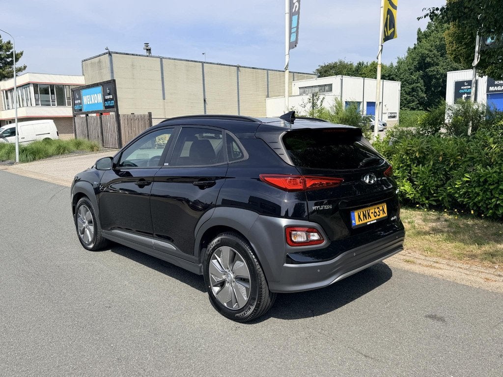 Hyundai Kona EV Premium Sky 64kWh 204PK Leder•Schuifdak, Auto's, Hyundai, Gebruikt, Lichtsensor, Zwart, Leder