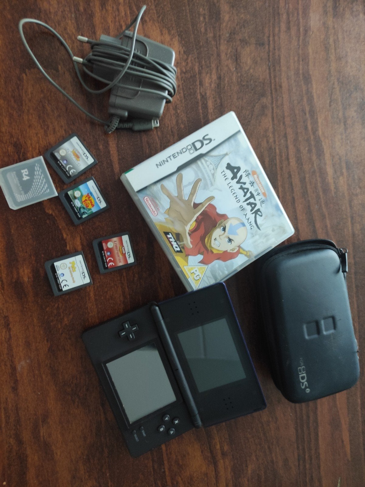Nintendo DS incl diverse spellen, Ophalen of Verzenden, Gebruikt, DS Lite
