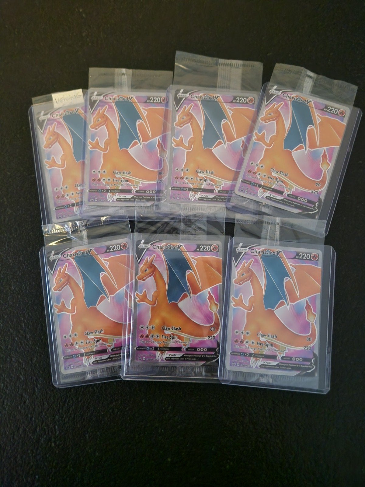 Charizard V swsh050 Black star promos sealed. tcg Pokémon, Hobby en Vrije tijd, Ophalen of Verzenden, Nieuw, Meerdere kaarten
