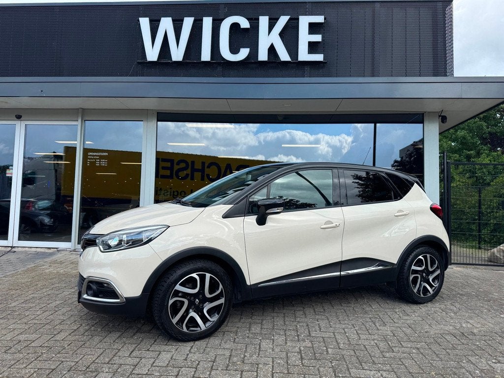 Renault Captur 1.2 TCe Dynamique Helly Hansen Automaat Navi, Auto's, Gebruikt, 4 cilinders, Wit, Origineel Nederlands