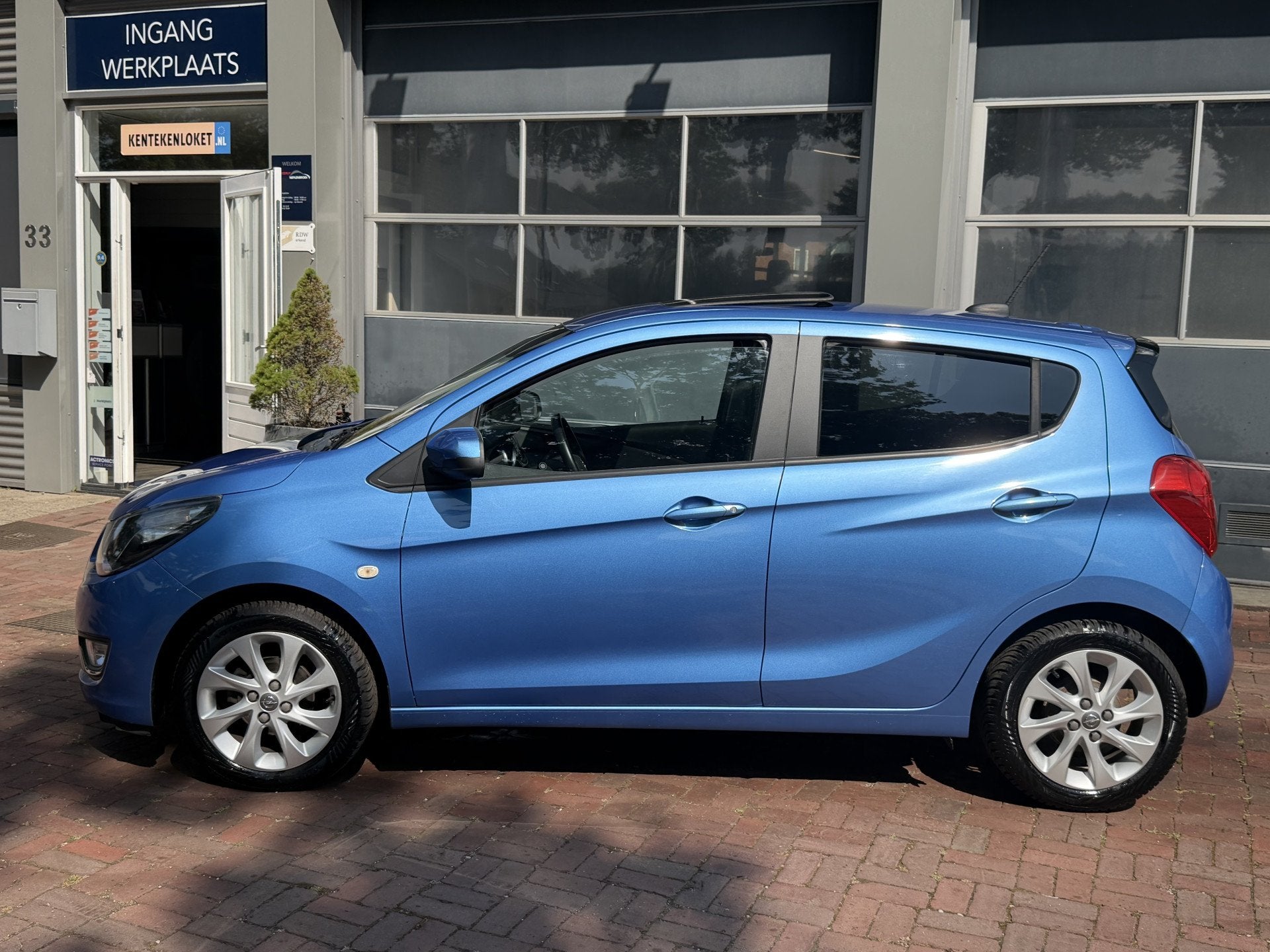Opel KARL 1.0 ecoFLEX Cosmo Airco,14Inch,Cv,Cruise,Schuifdak, Auto's, Opel, Voorwielaandrijving, Gebruikt, Blauw, Leder en Stof