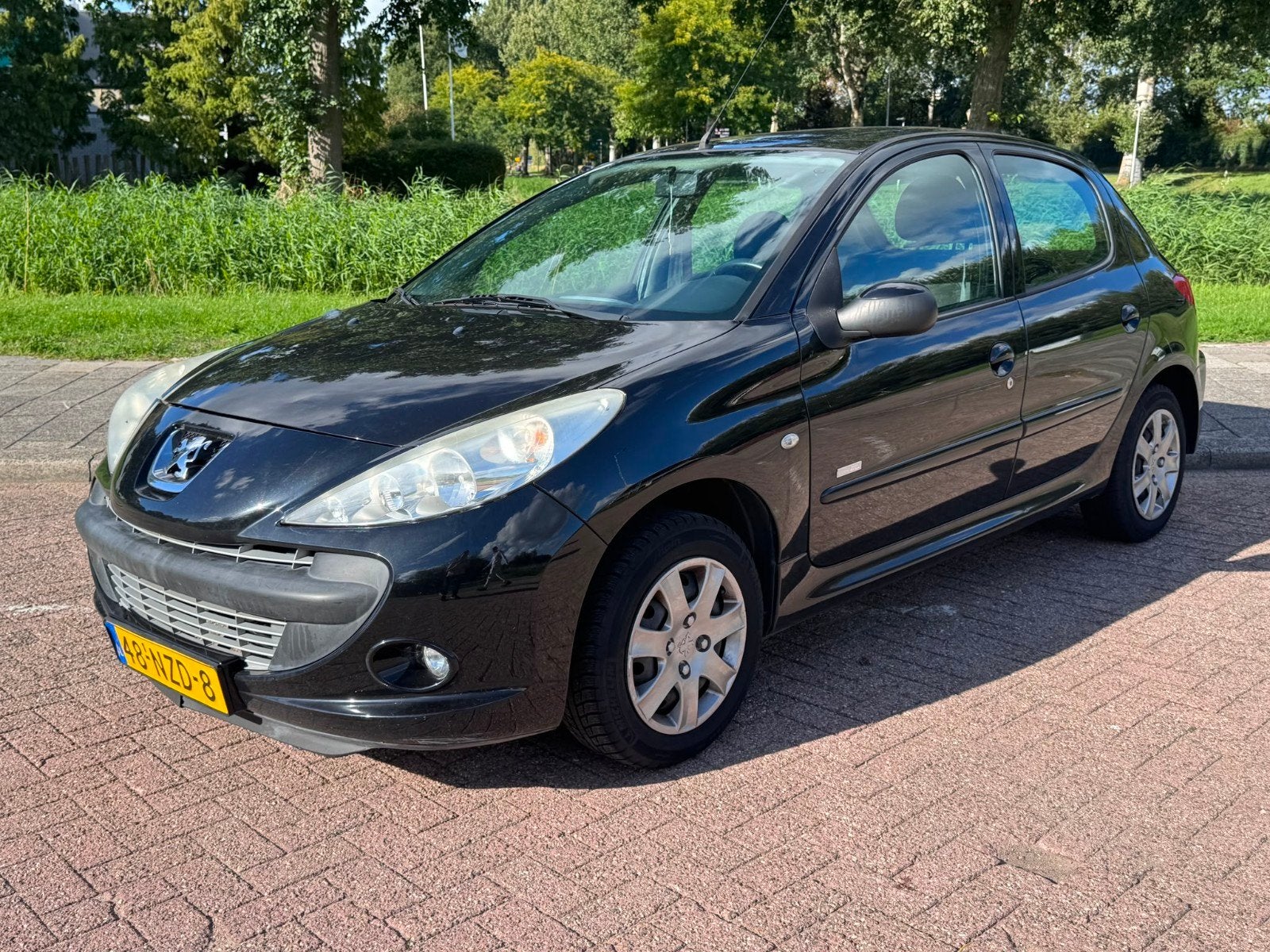 Peugeot 206+ 1.4 Millesim 200 | Airco | Nieuwe distributie, Auto's, Peugeot, 206+, 1360 cc, 4 cilinders, Zwart