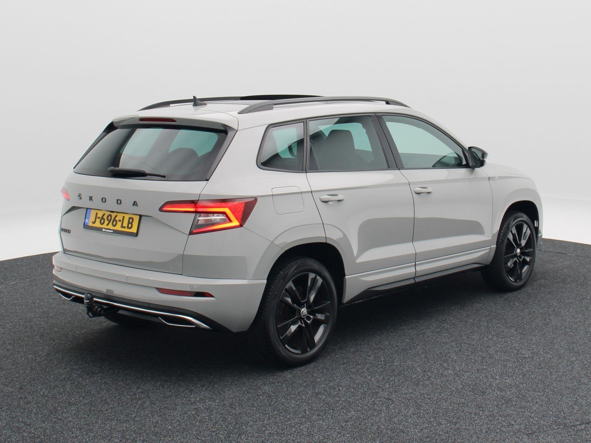Skoda Karoq 1.5 TSi 150 Pk Automaat Sportline Business | Tre, Auto's, Stof, 4 cilinders, 150 pk, Bedrijf