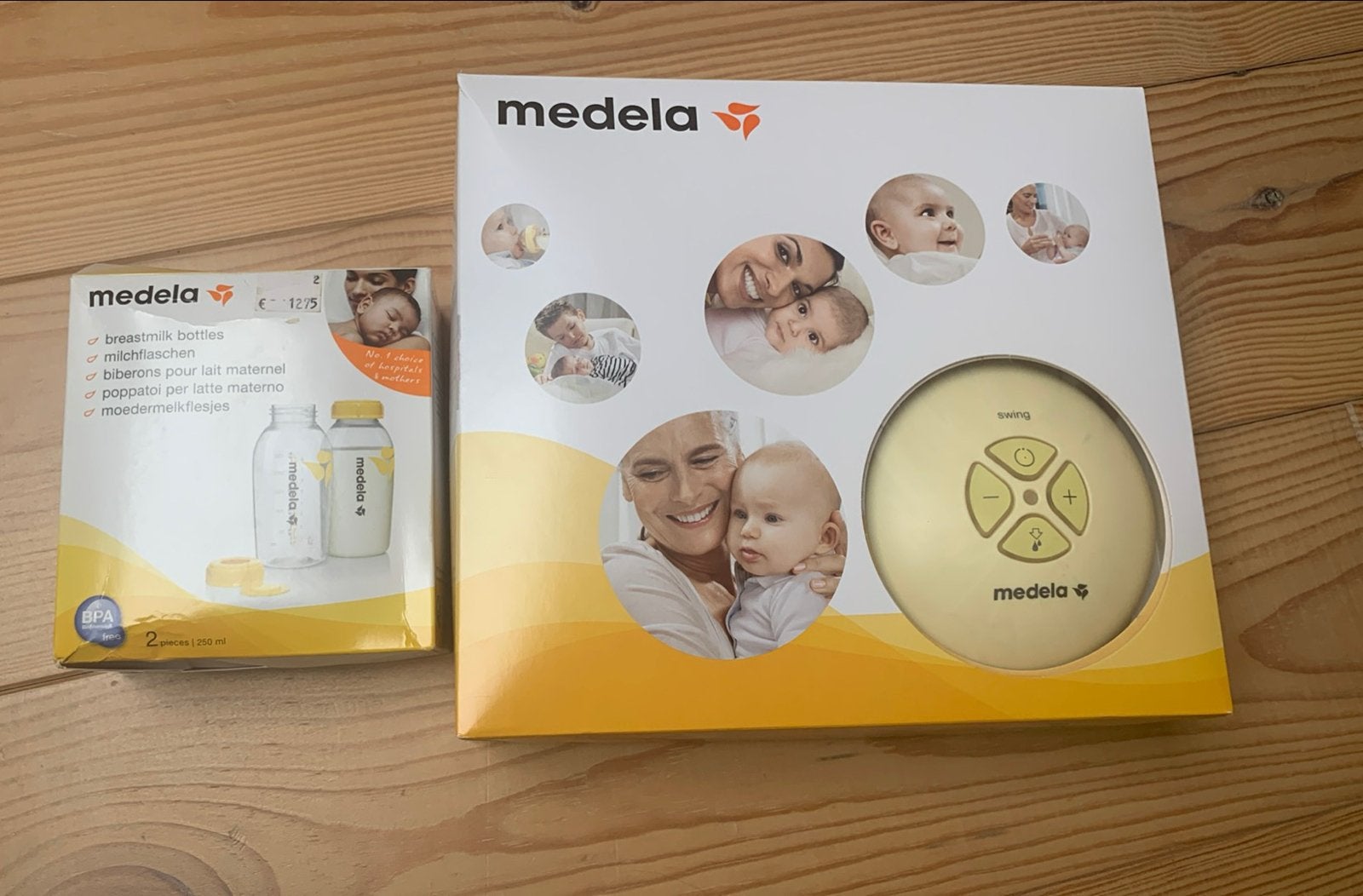Medela Swing Borstkolf met accessoires en flessen, Ophalen of Verzenden, Zo goed als nieuw, Borstkolf
