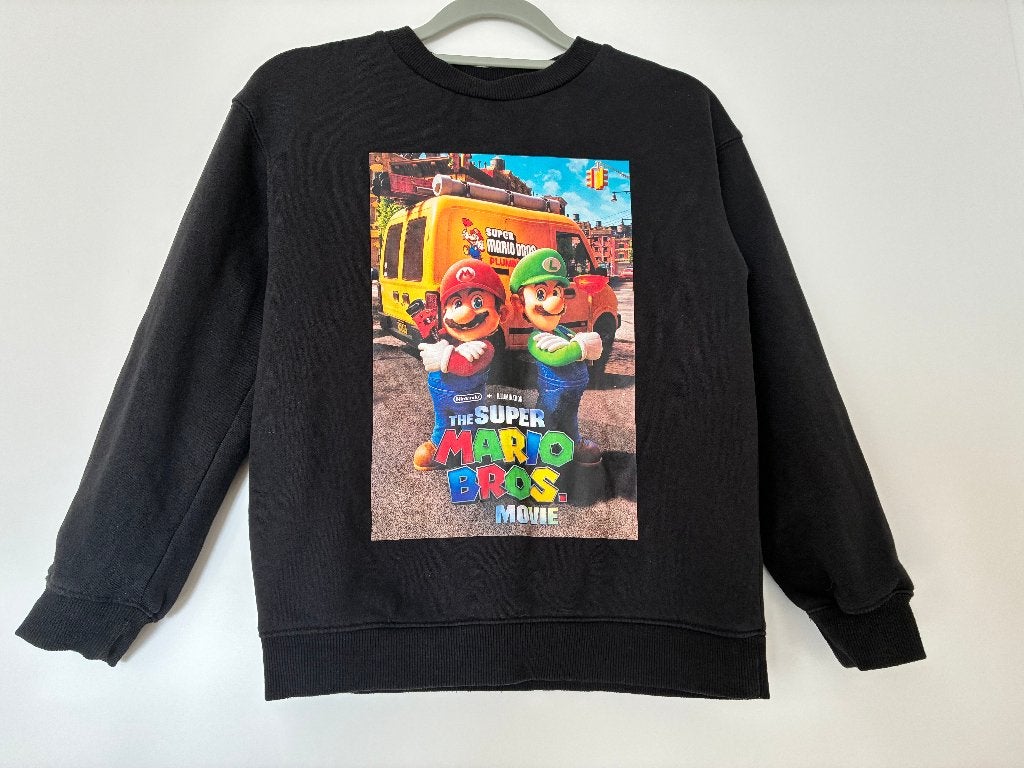 Super Mario Bros. Movie Sweater Zwart maat 134 - 140 H&M, Trui of Vest, H&M, Ophalen of Verzenden, Zo goed als nieuw