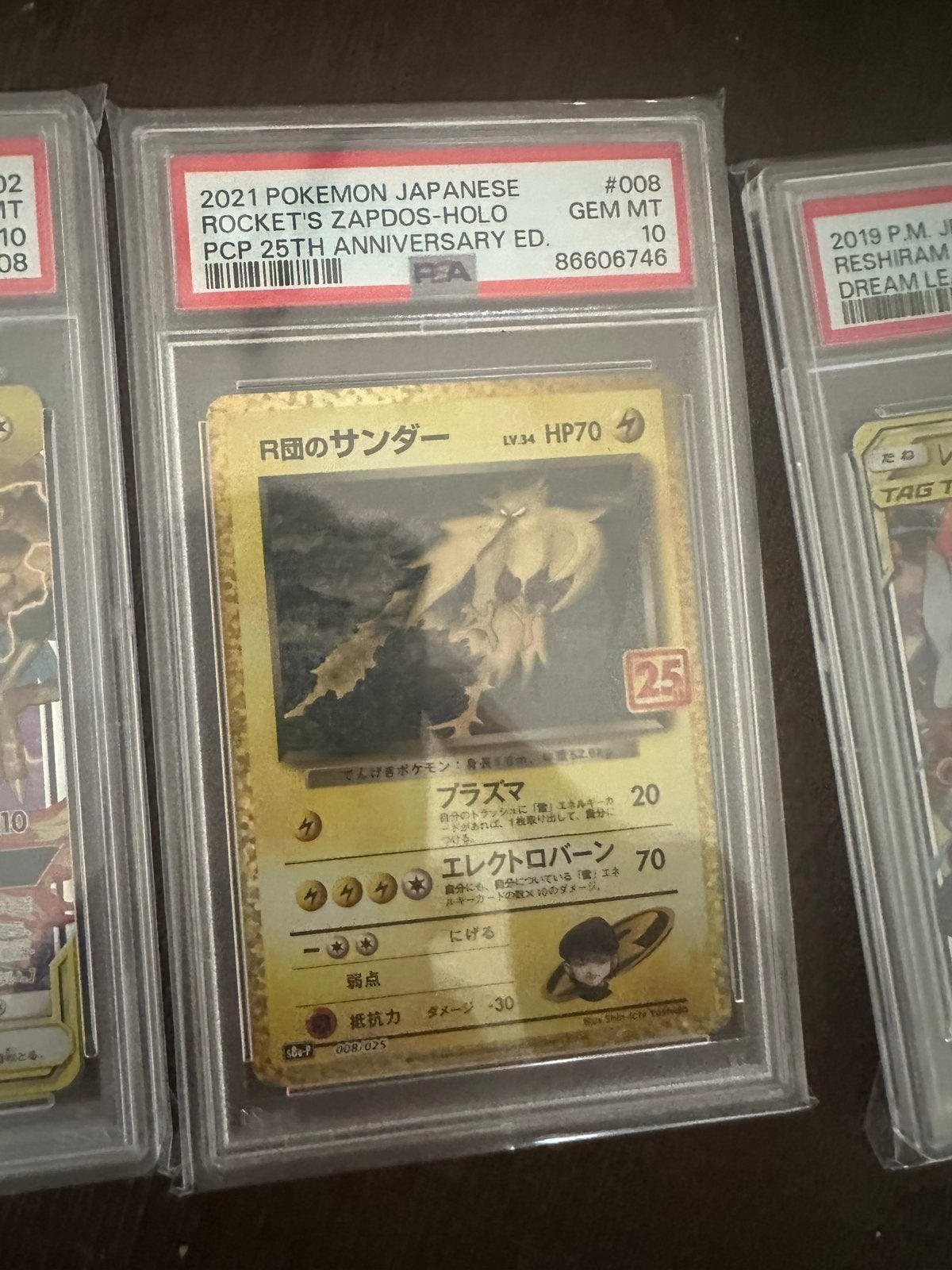2021 Japanse Rocket's Zapdos-Holo PSA 10 - 25th Anniversary, Ophalen of Verzenden, Nieuw, Losse kaart, Foil