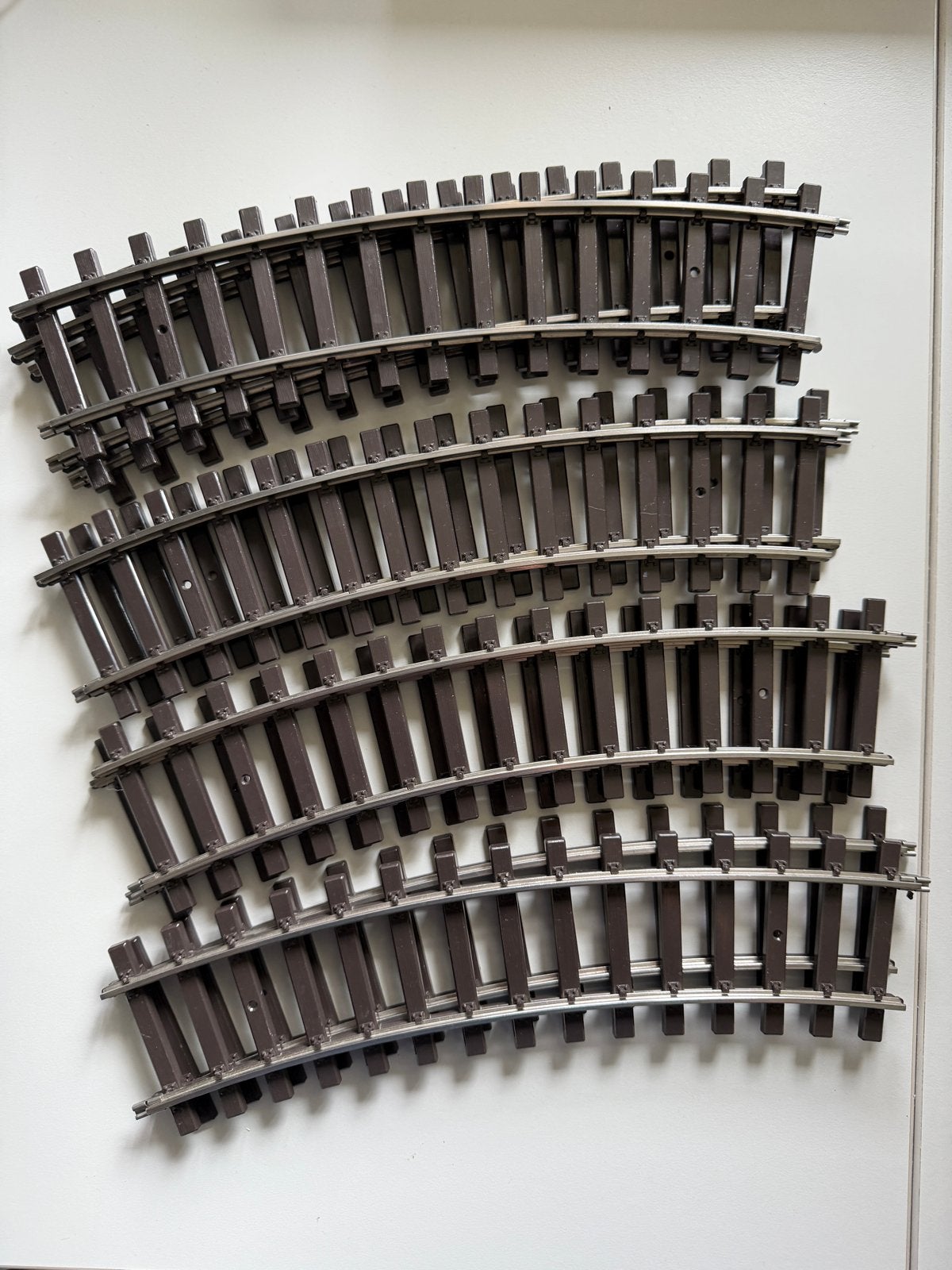 Märklin Spoor 1 - 9x 5922 Gebogen Rails - Zo goed als nieuw, Hobby en Vrije tijd, Modeltreinen | Overige schalen, Wisselstroom