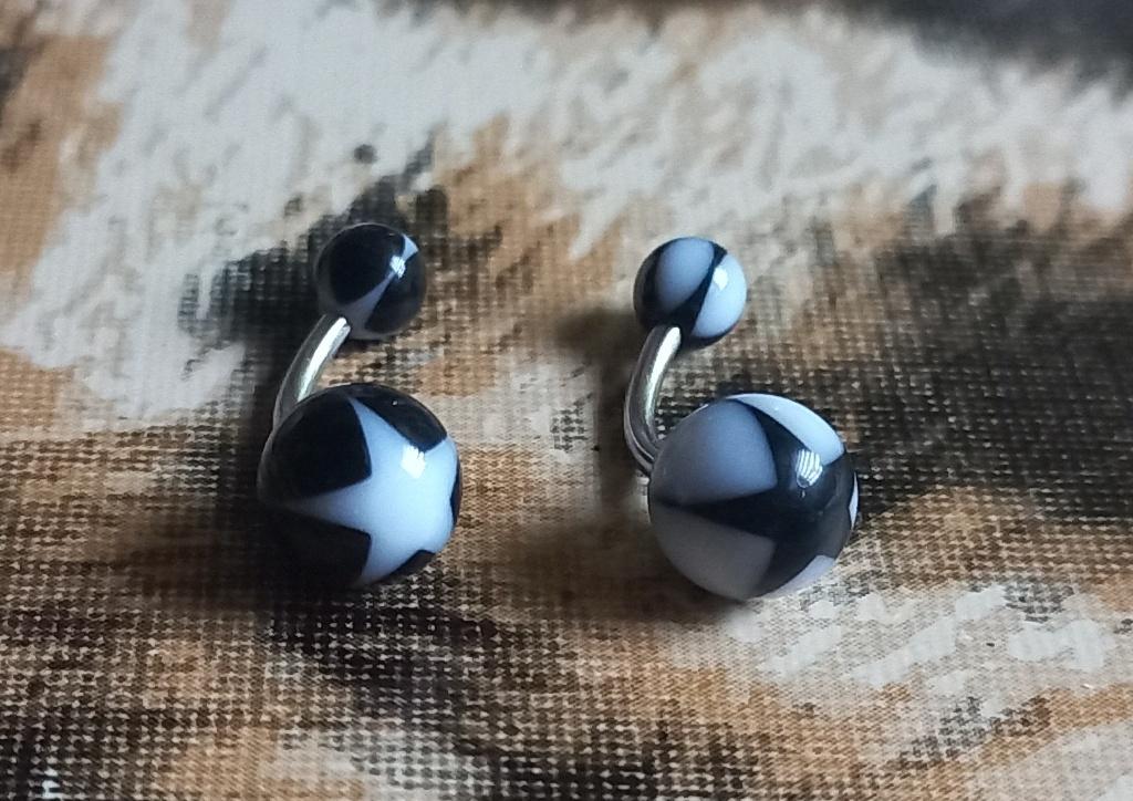 Zwart witte sterretjes navelpiercing, Sieraden, Tassen en Uiterlijk, Piercings, Ophalen of Verzenden, Nieuw, Staal, Navelpiercing