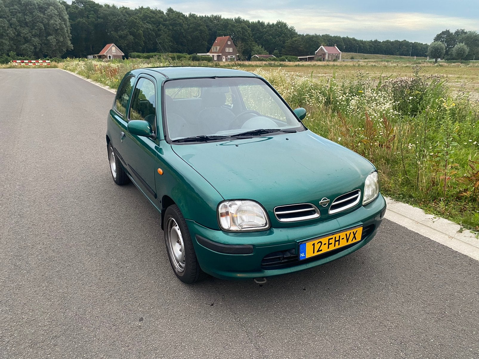 Nissan Micra 1.0 met airco, Auto's, Nissan, Voorwielaandrijving, Stof, 4 cilinders, Origineel Nederlands