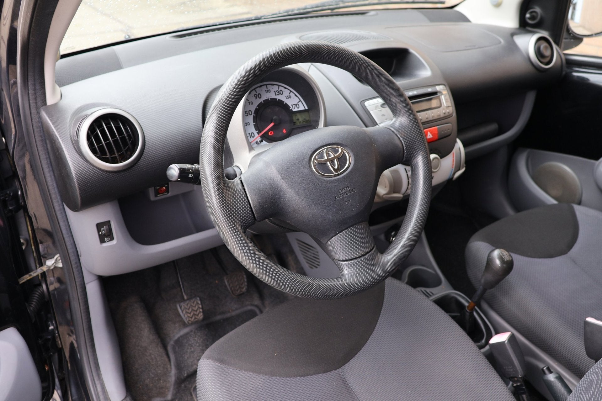 Toyota Aygo 1.0-12V +, Voorwielaandrijving, Stof, Gebruikt, Zwart