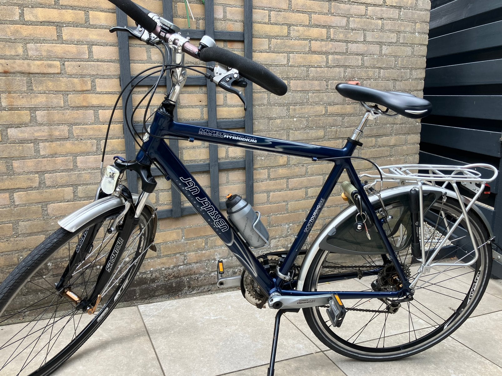 Jan Janssen hybridium heren fiets .kleur blauw., Versnellingen, Zo goed als nieuw, 57 tot 61 cm, Ophalen