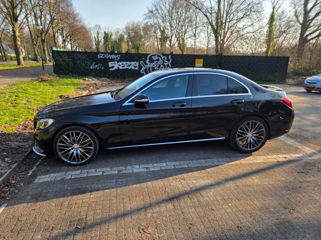 Mercedes-Benz C-Klasse AMG  C180 1.6 115KW Aut7 2014 Zwart, Auto's, Automaat, 1800 kg, Zwart, Zwart