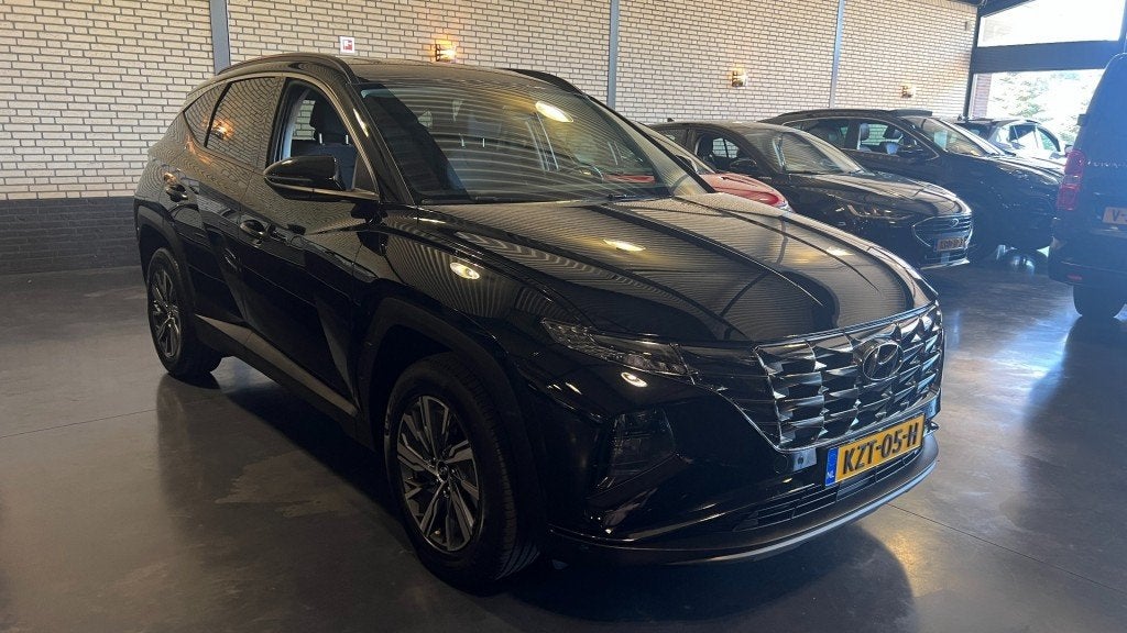 Hyundai TUCSON 1.6 T-GDI HEV Hybride 230 Pk 1650 kg Trekhaak, Auto's, Automaat, Gebruikt, Huisgarantie, 4 cilinders