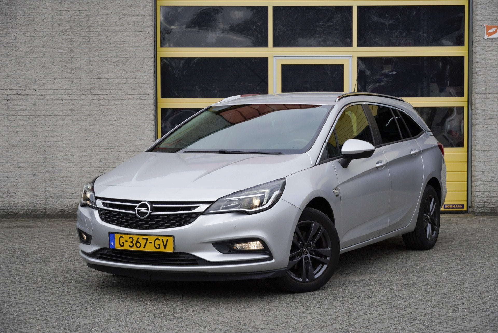 Opel Astra Sports Tourer 1.0 Turbo 120 Jaar Edition BJ2019 L, Dealer onderhouden, Stof, Gebruikt, 1178 kg