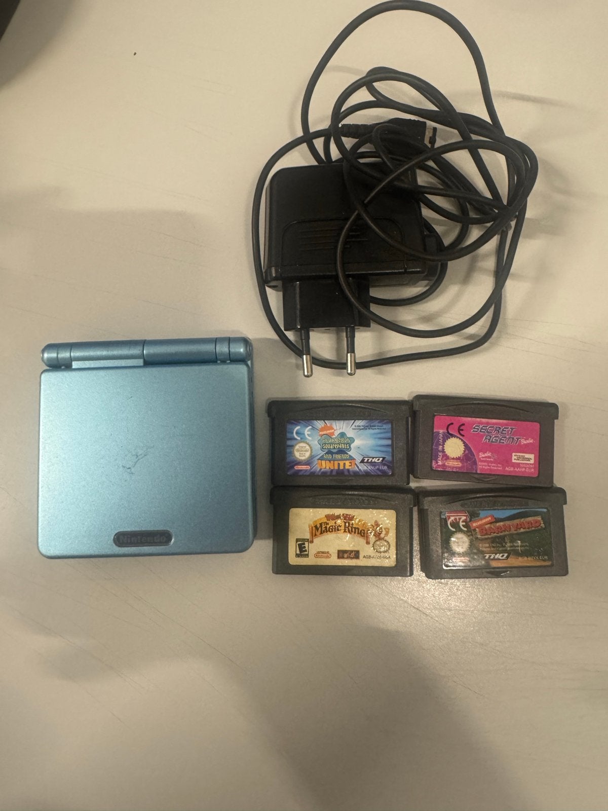 Nintendo Game Boy Advance SP met 4 games en oplader, Ophalen of Verzenden, Gebruikt, Game Boy Advance SP, Met games