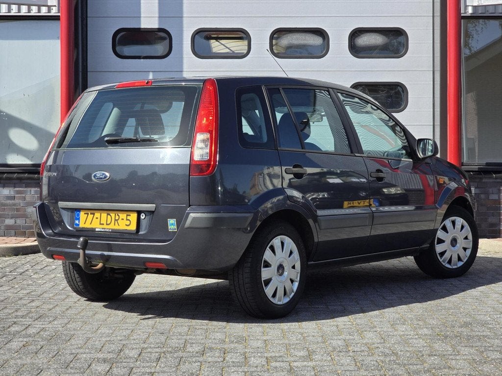 Ford Fusion 1.4-16V Cool & Sound Airco/Trekhaak/AUX, Auto's, Ford, Voorwielaandrijving, Gebruikt, Zwart, Elektrische ramen