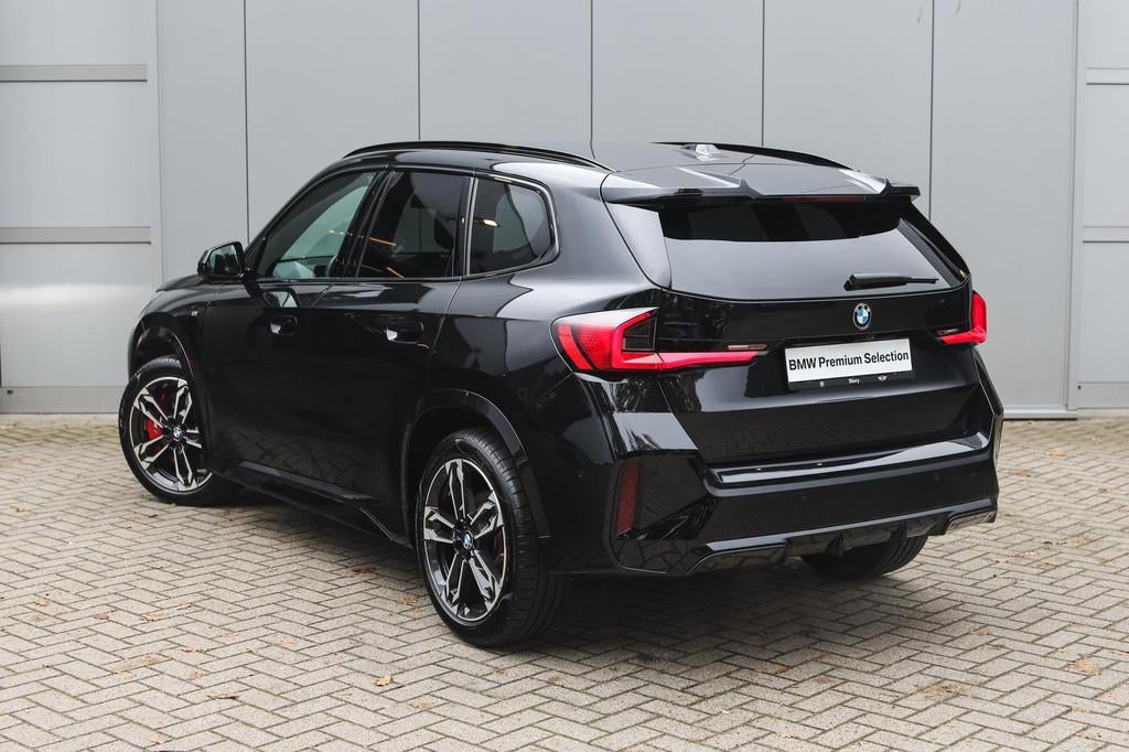 BMW X1 xDrive20d High Executive M Sport Automaat / Trekhaak, Auto's, 12 maanden, 4 cilinders, Zwart, Bedrijf