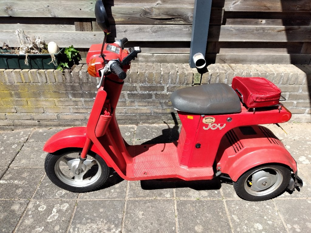 Honda Joy 3 wieler geel NL kenteken, Fietsen en Brommers, Scooters | Overige merken, Ophalen, Honda, Maximaal 45 km/u, Zo goed als nieuw