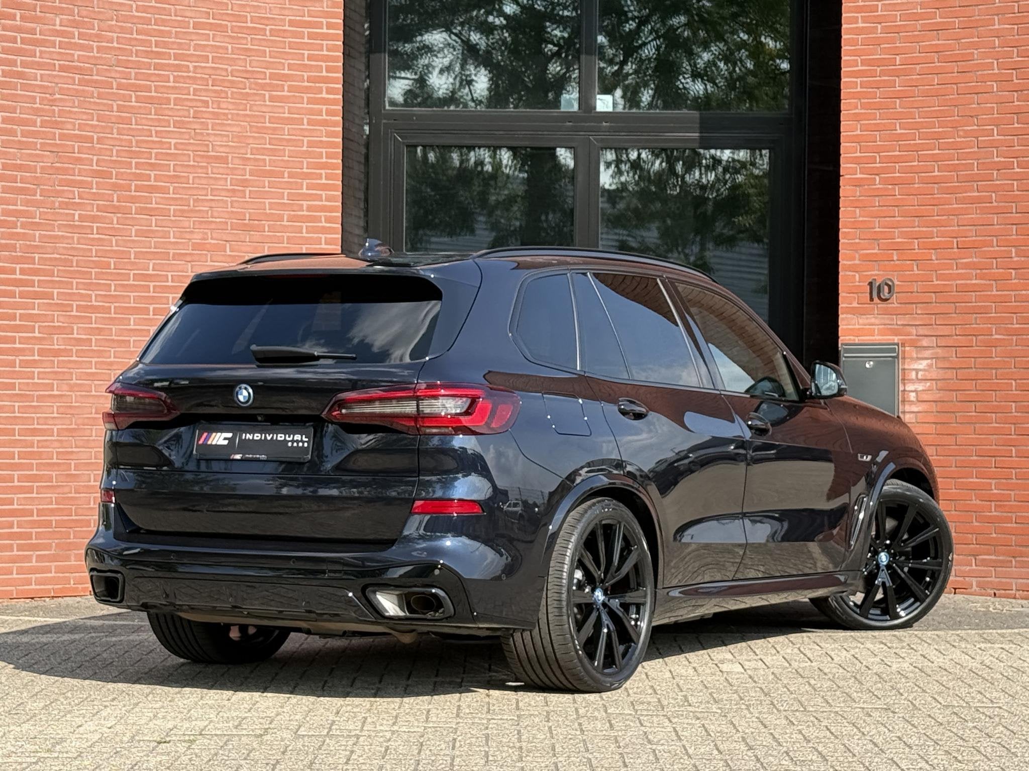 BMW X5 xDrive45e M-Sport 4-Wielsturing B&W CoPilot Sky, Auto's, Automaat, Gebruikt, 394 pk, Zwart