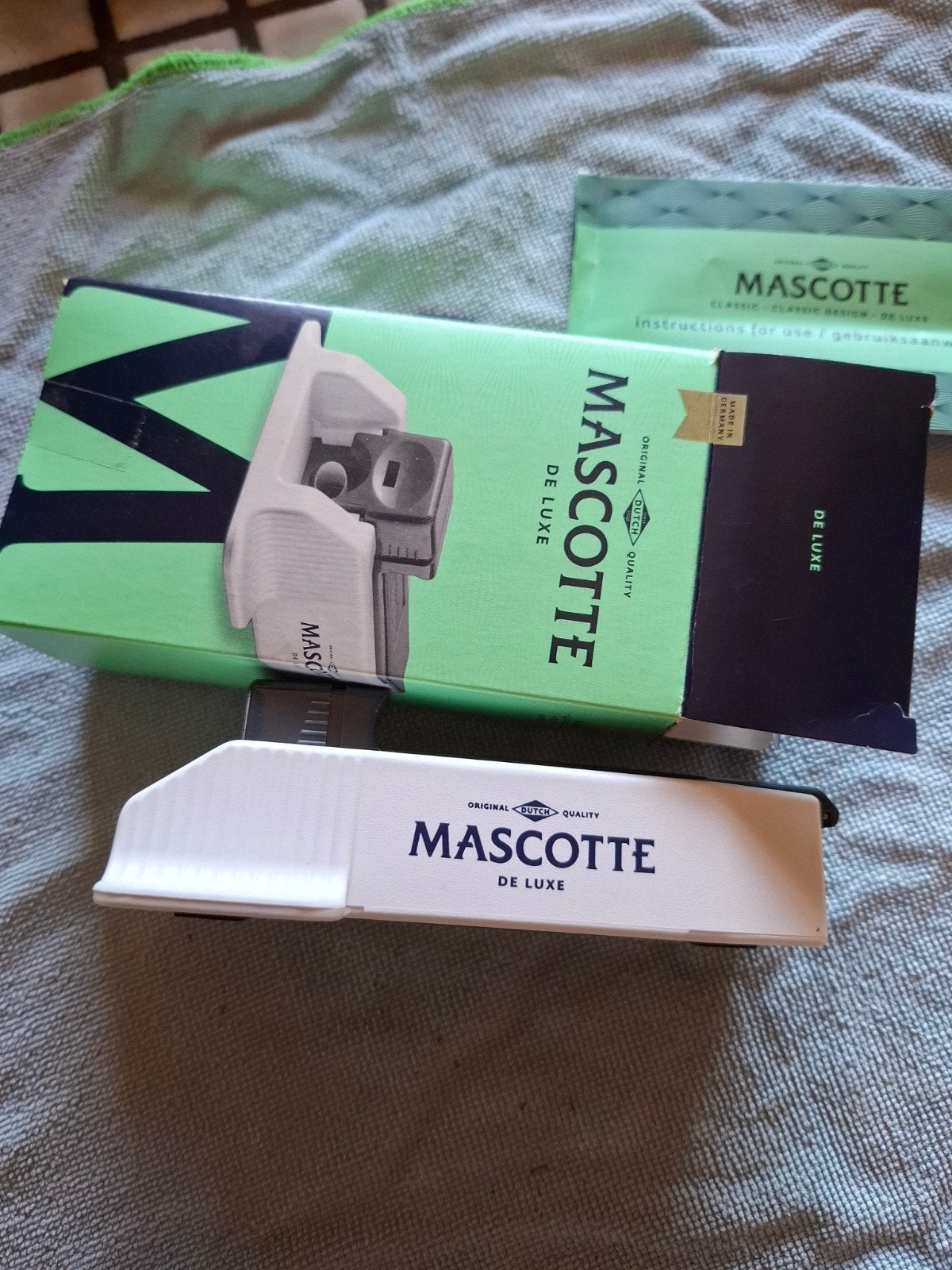 mascotte sigarettenmaker de luxe, Verzenden, Zo goed als nieuw, Sigarenbandjes