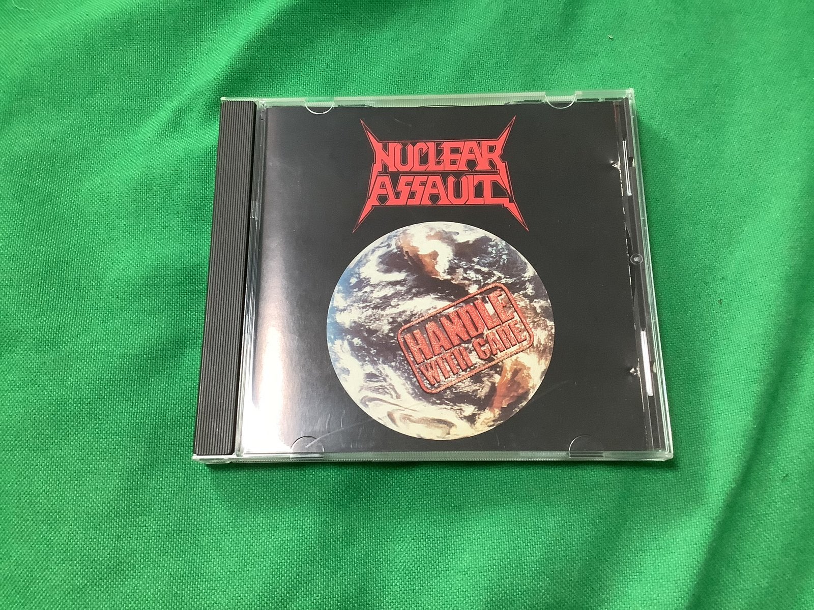Nuclear Assault-Handle With Care cd (UK), Ophalen of Verzenden, Gebruikt
