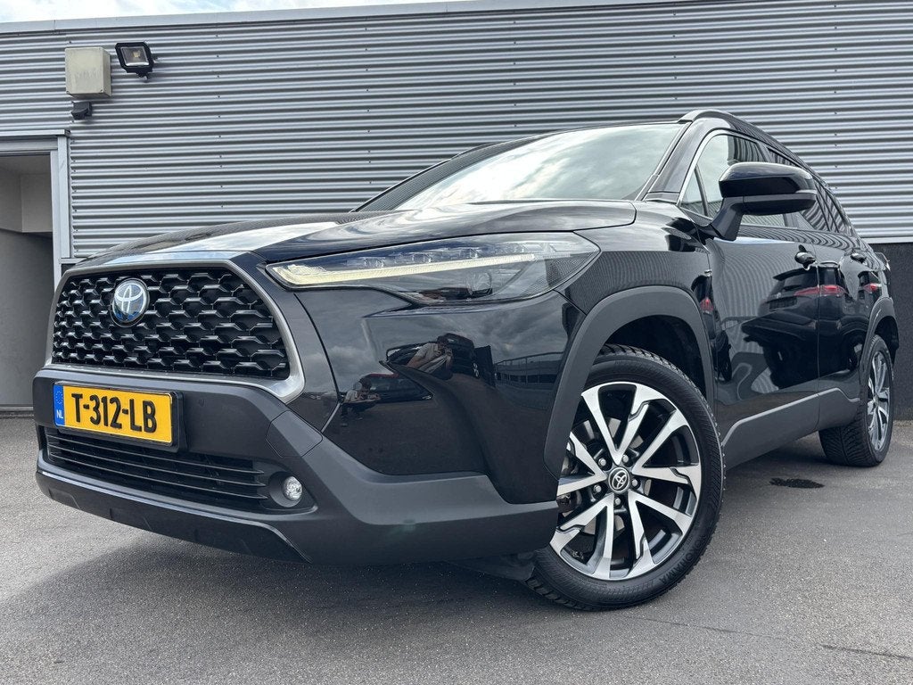 Toyota Corolla Cross 2.0 High Power Hybrid First Edition Nie, Auto's, Toyota, Gebruikt, 4 cilinders, Leder en Stof, Zwart