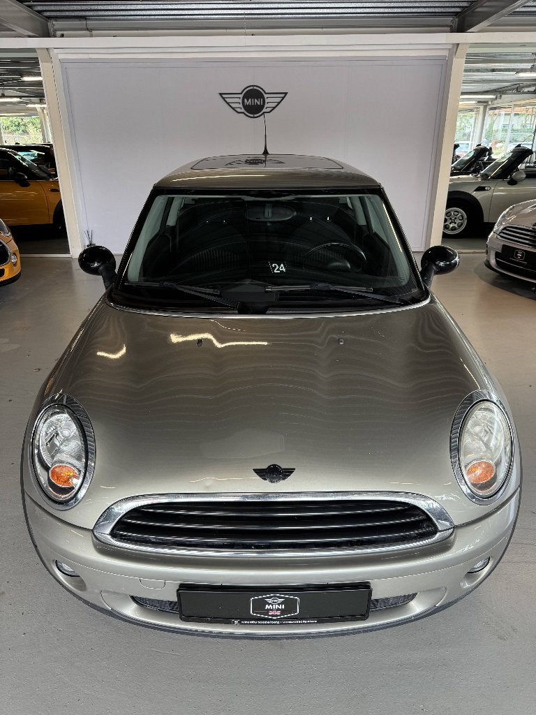 Mini 1.4 16V ONE 2007 Champagne ( 3 MAANDEN GARANTIE ), Auto's, Voorwielaandrijving, Stof, Zwart, 4 stoelen