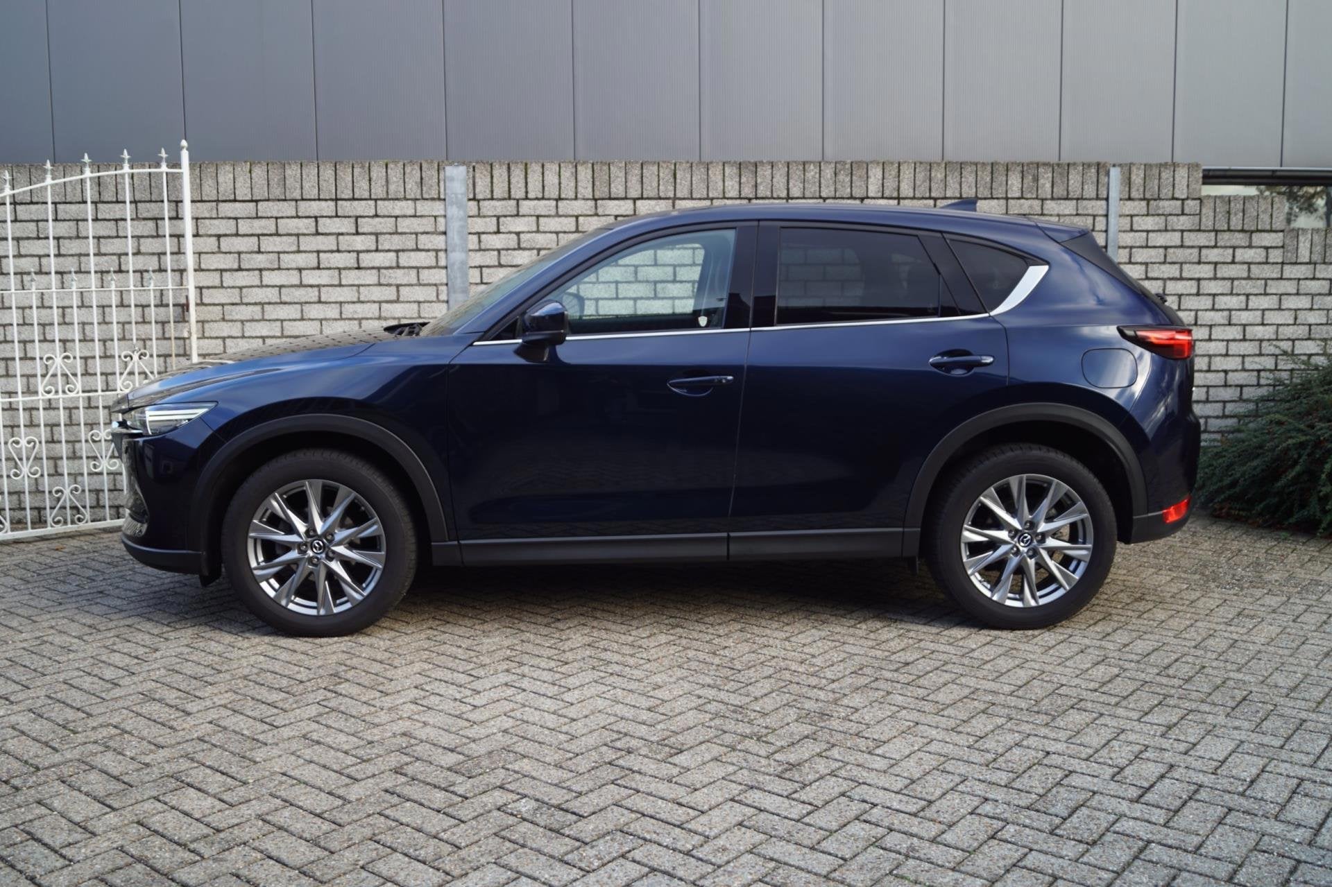 Mazda CX-5 2.0 4WD SkyActiv-G 165 Signature Autom Leder Stoe, Auto's, Gebruikt, 4 cilinders, 2000 kg, Blauw