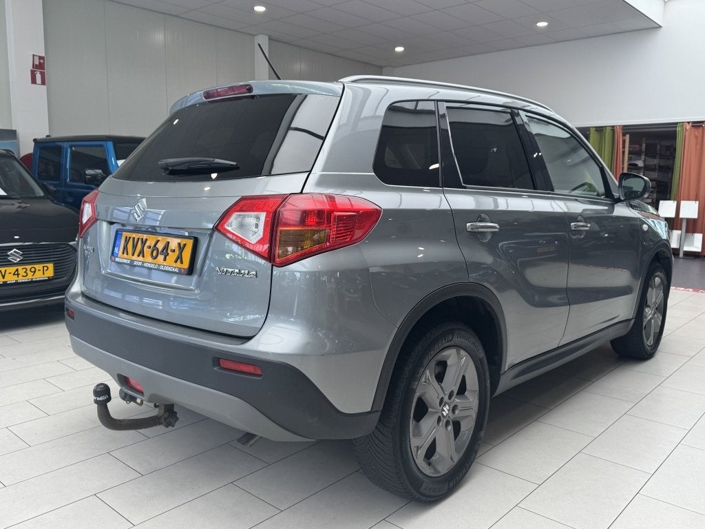 Suzuki Vitara 1.6 High Executive [ TREKHAAK I ALL-SEASON I 1, Keurmerk '100% Onderhouden', 12 maanden, Stof, Gebruikt