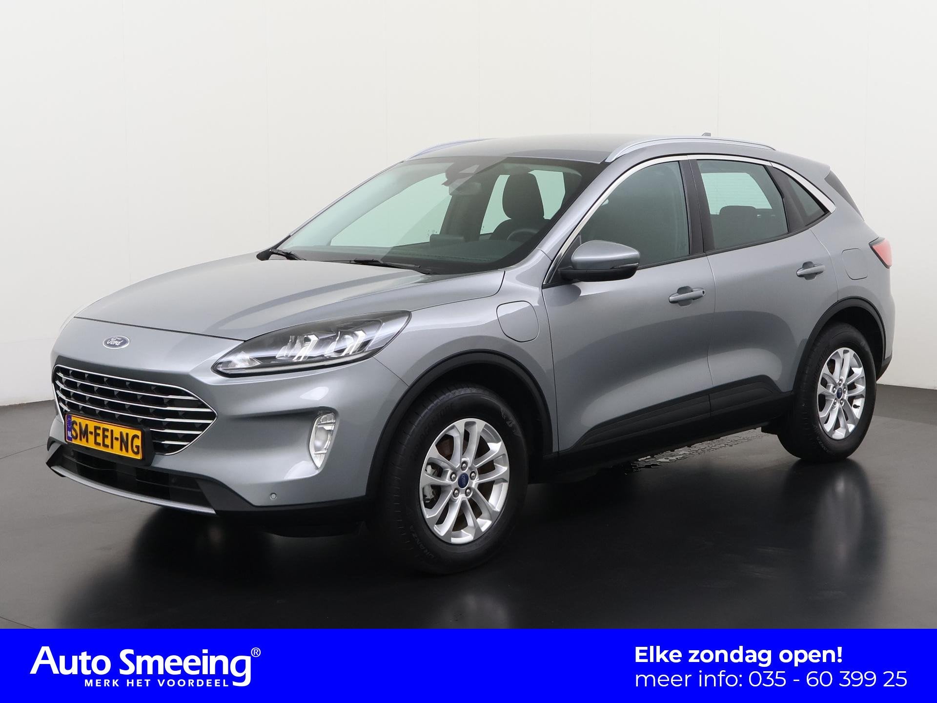 Ford Kuga 2.5 PHEV Titanium | Trekhaak | Stuurverwarming | Z, Auto's, Gebruikt, Euro 6, 4 cilinders, Plug-in hybride