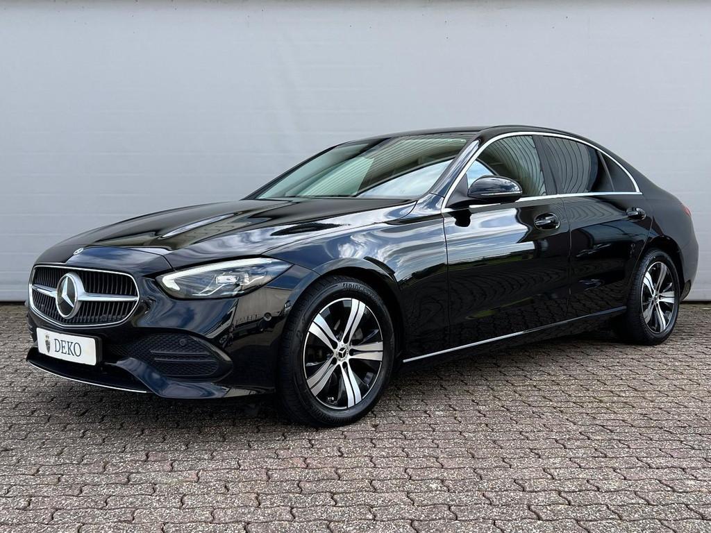 Mercedes-Benz C-klasse 180 Sedan | Luxury line | Trekhaak |, Automaat, Zwart, 4 cilinders, Leder en Stof
