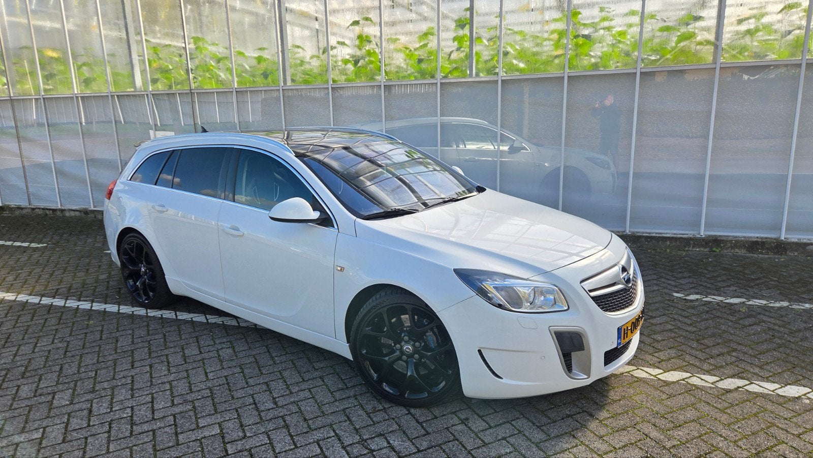 ✅️️Opel Insignia OPC UNLIMITED 325pk Sports Tourer 4X4 2011, Auto's, 1800 kg, Zwart, Wit, Leder