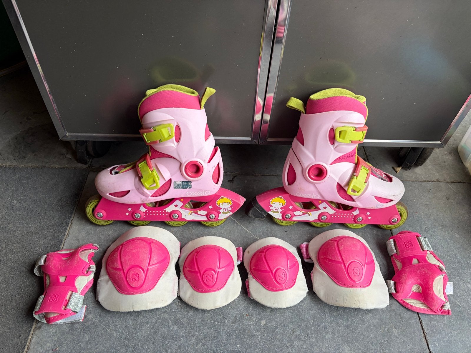 Roze Oxelo skeelers/rolschaatsen met beschermset, maat 28-30, Ophalen, Verstelbaar, Gebruikt, Kinderen
