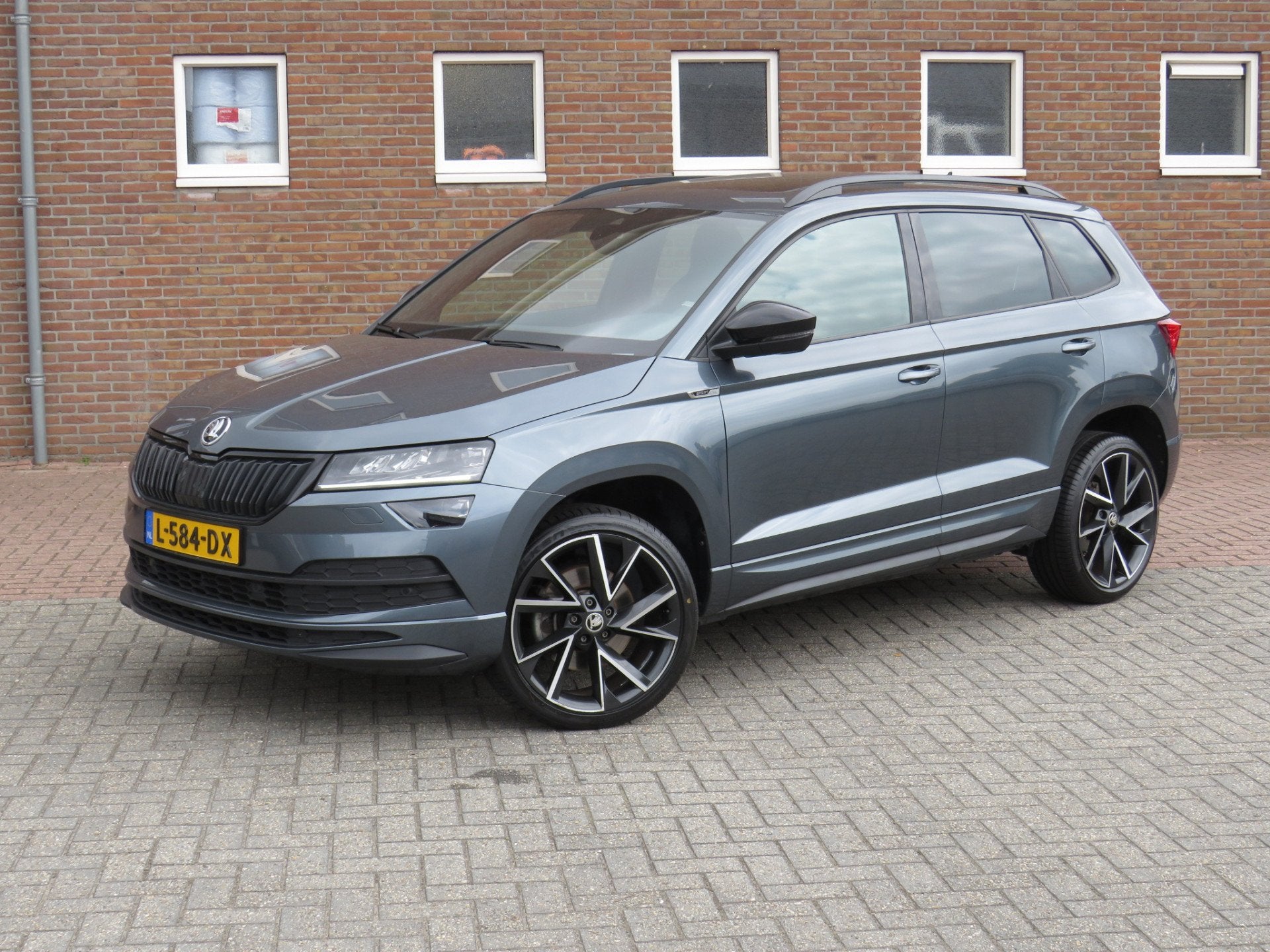Skoda Karoq 1.5 TSI 150Pk ACT Sportline Business DSG * Rijkl, 4 cilinders, Alcantara, Bedrijf, 19 km/l