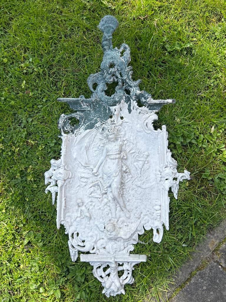 Decoratief gietijzeren ornament, Ophalen