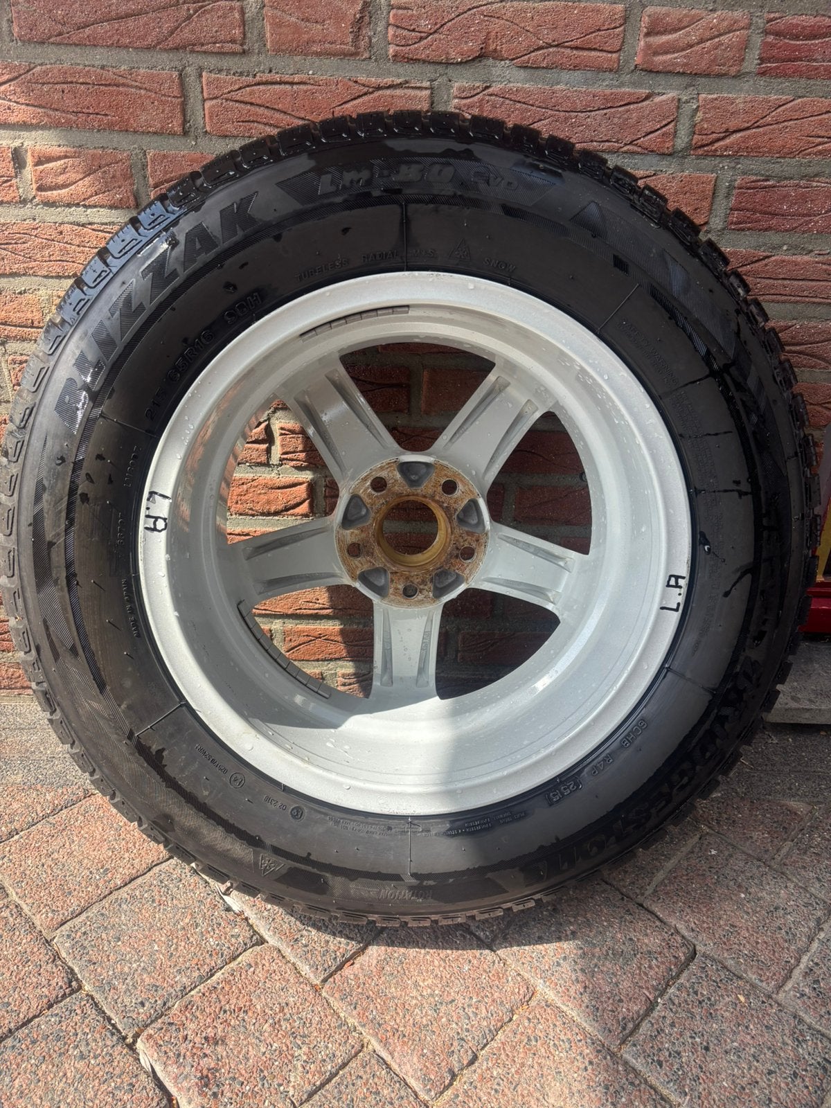 Te koop z.g.a.n. winterbanden op lichtmetalen velg., Auto-onderdelen, Banden en Velgen, Ophalen, 16 inch, Banden en Velgen, Winterbanden