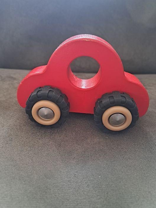 houten auto van het merk goki, Ophalen