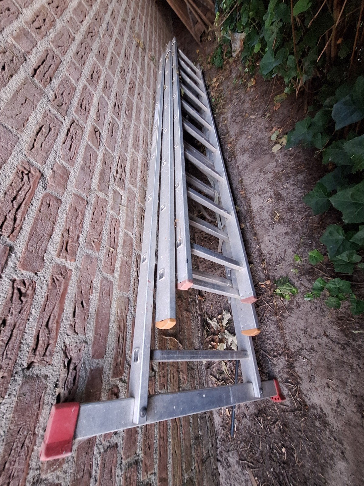 Lange stevige uitschuifbare trap, Ophalen, Gebruikt, 2 tot 4 meter