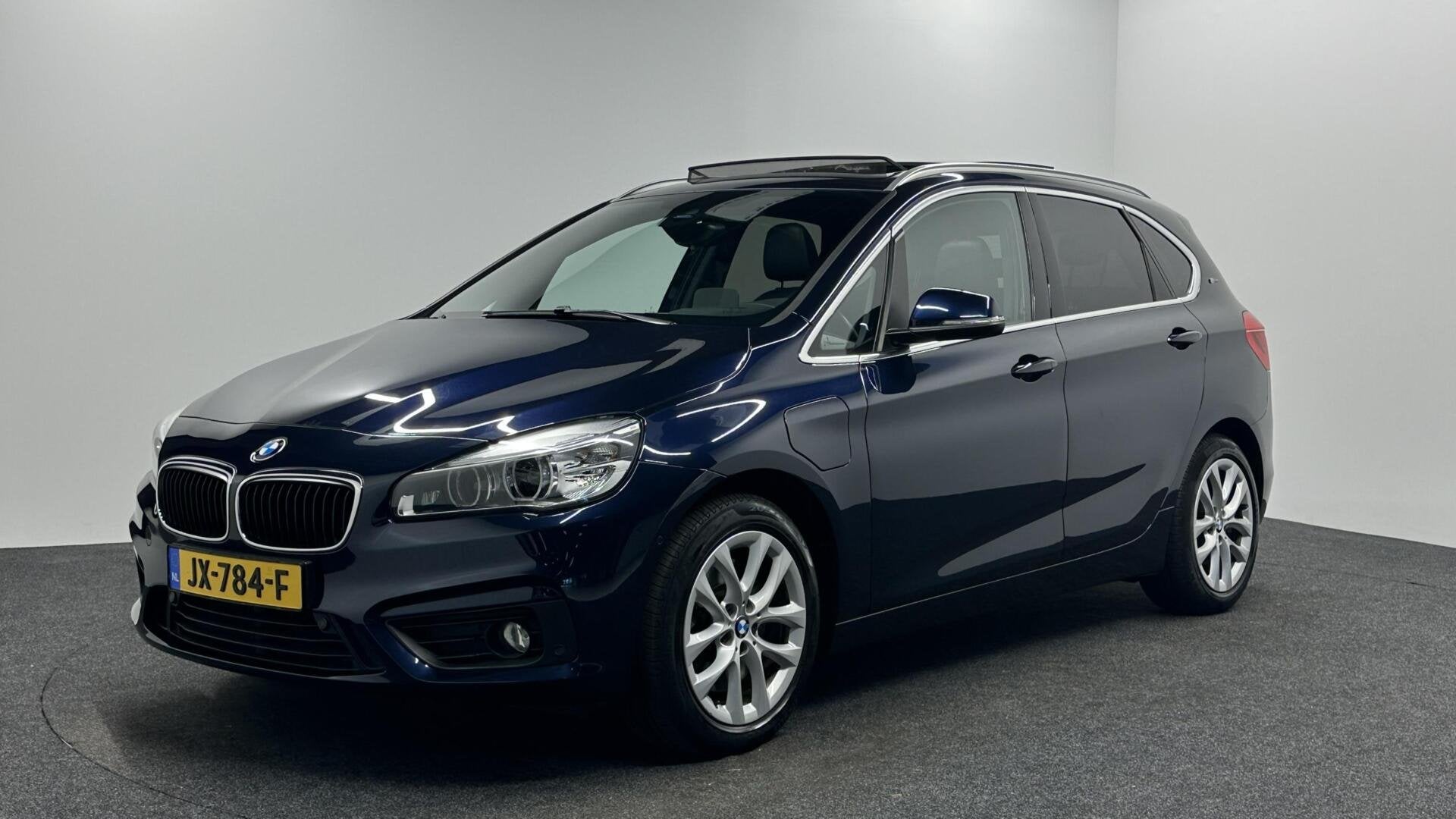BMW 2-serie Active Tourer 225xe Centennial High Executive PA, Auto's, Automaat, Gebruikt, Met garantie (alle), Blauw