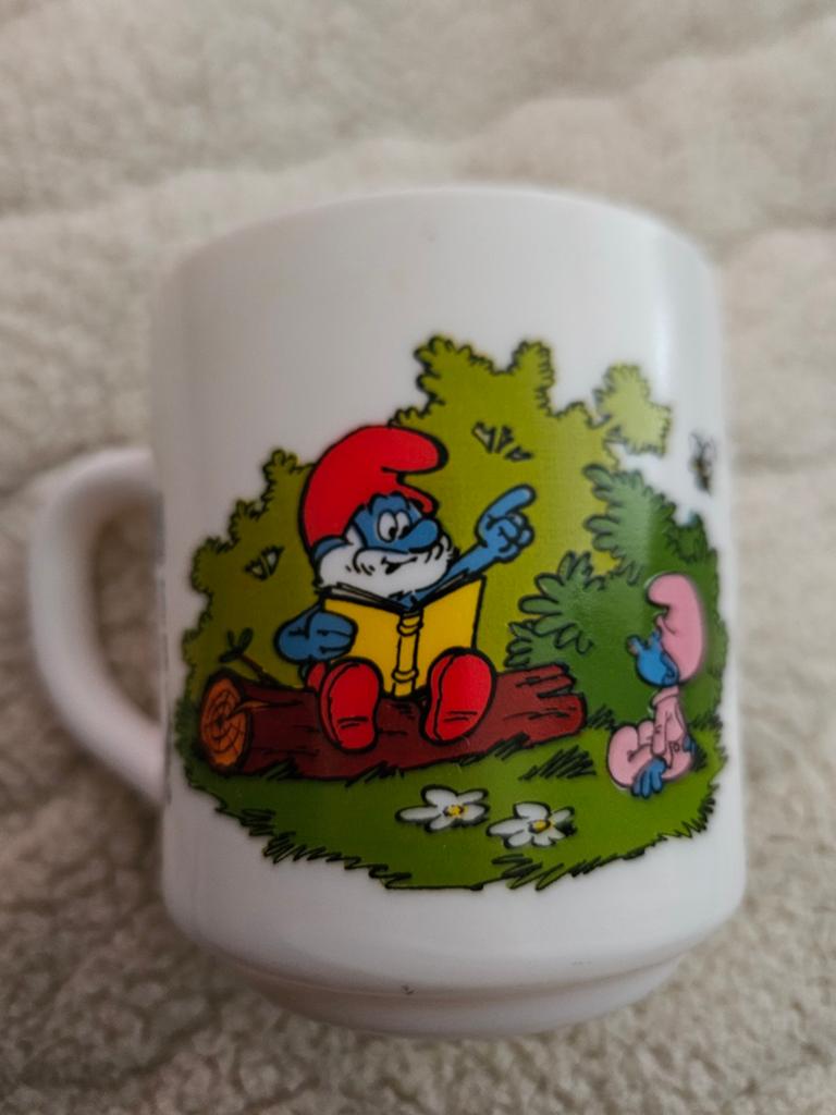 Smurfen Mok uit 1986 Vintage, Ophalen of Verzenden, Zo goed als nieuw, Verschillende Smurfen, Gebruiksvoorwerp