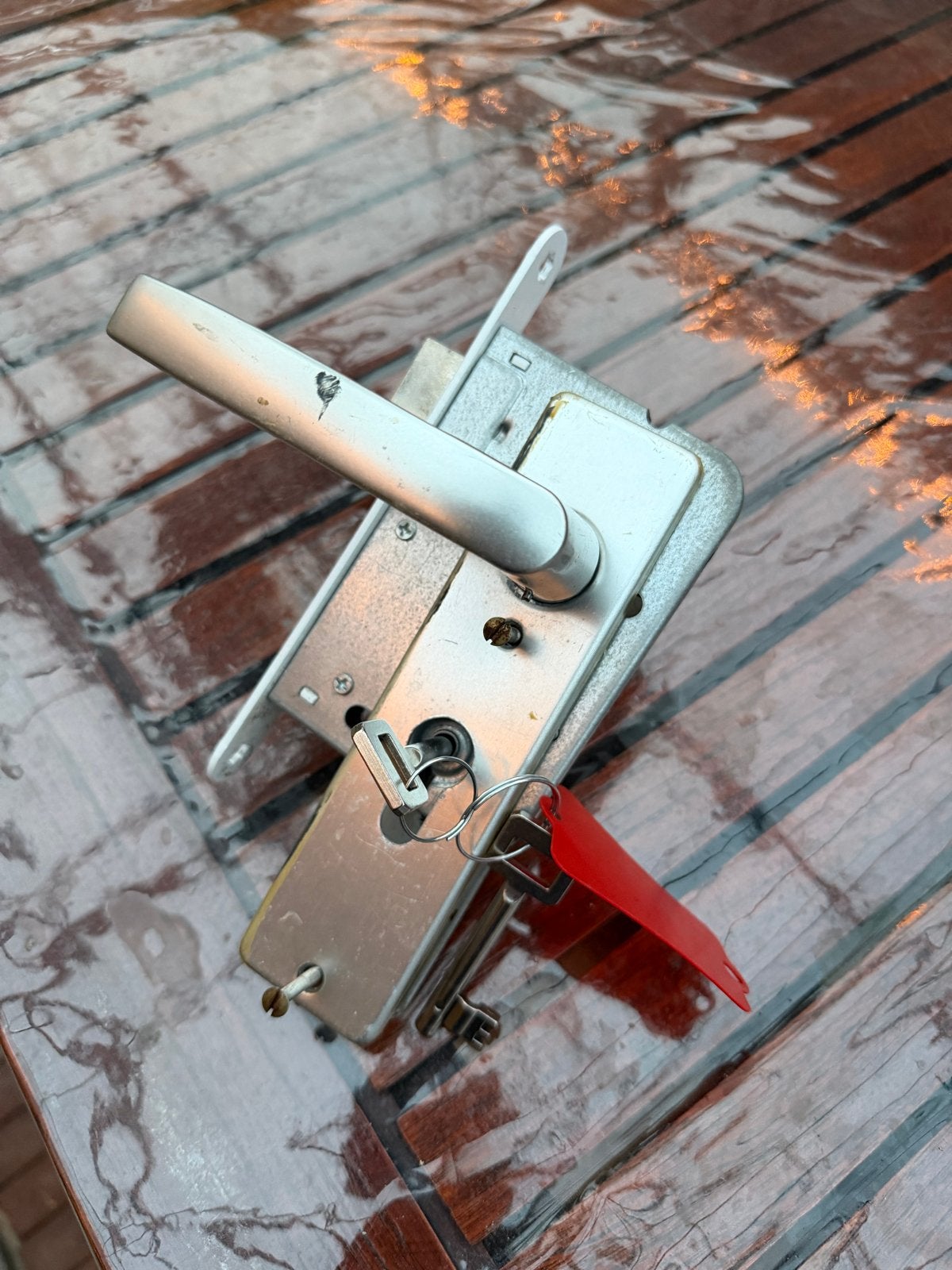Deurklink met slot en sleutels, Ophalen of Verzenden, Gebruikt, Rvs, Klink of Kruk