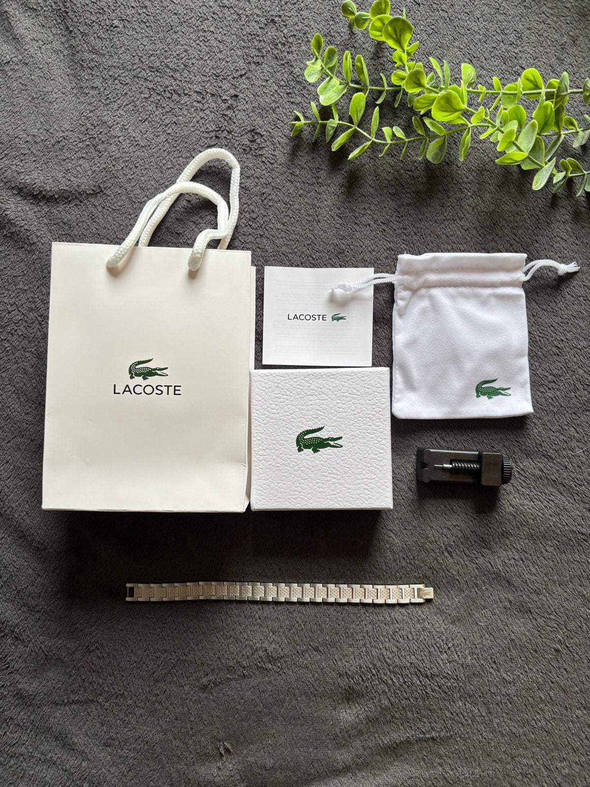 Lacoste Armband Zilverkleurig met Roségouden Details, Ophalen of Verzenden, Zo goed als nieuw, Zilver, Staal