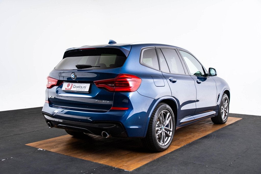 BMW X3 xDrive30e High Executive M Sport - Trekhaak - Panoram, Auto's, BMW, Gebruikt, 4 cilinders, Blauw, Leder en Stof