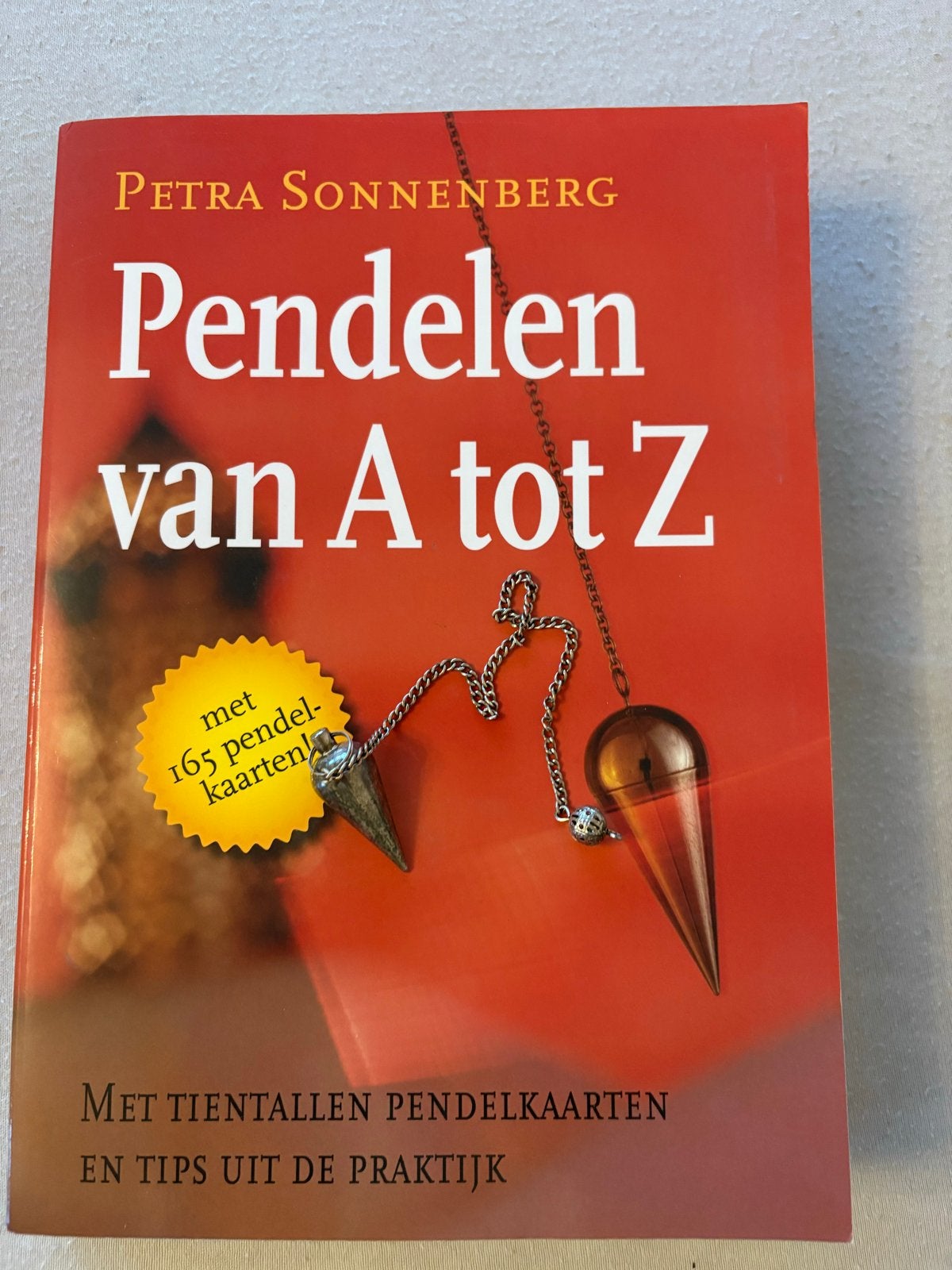 Pendelen van A tot Z - Petra Sonnenberg, Boeken, Ophalen of Verzenden, Zo goed als nieuw, Spiritualiteit algemeen, Instructieboek