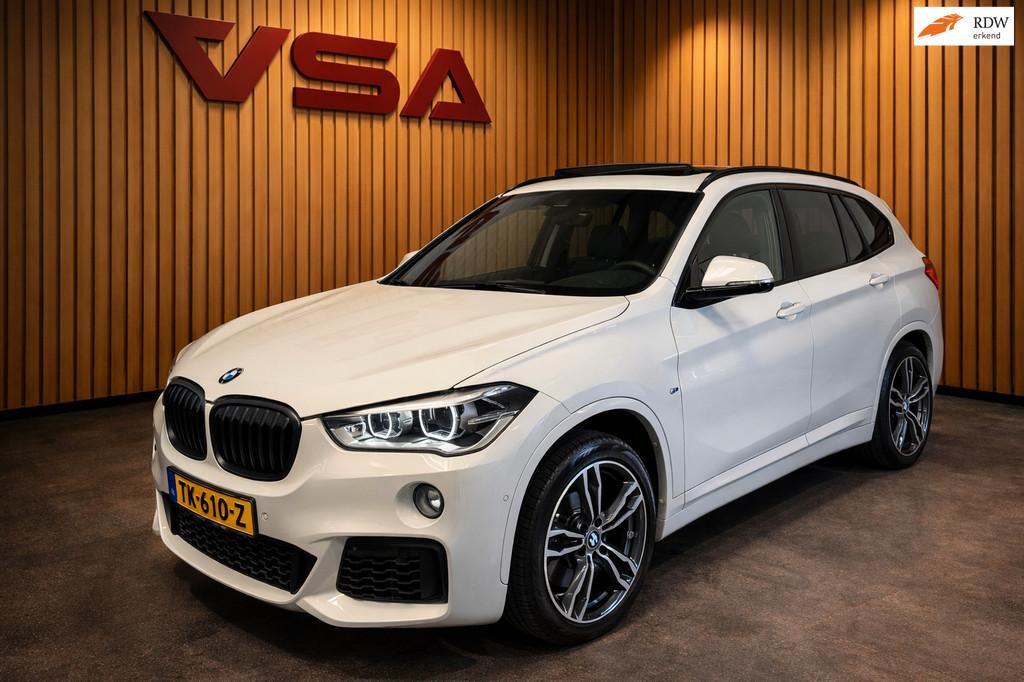 BMW X1 SDrive20i High Executive M-pakket|Stoelvw|Panorama|Tr, 1998 cc, Met garantie (alle), Wit, Leder