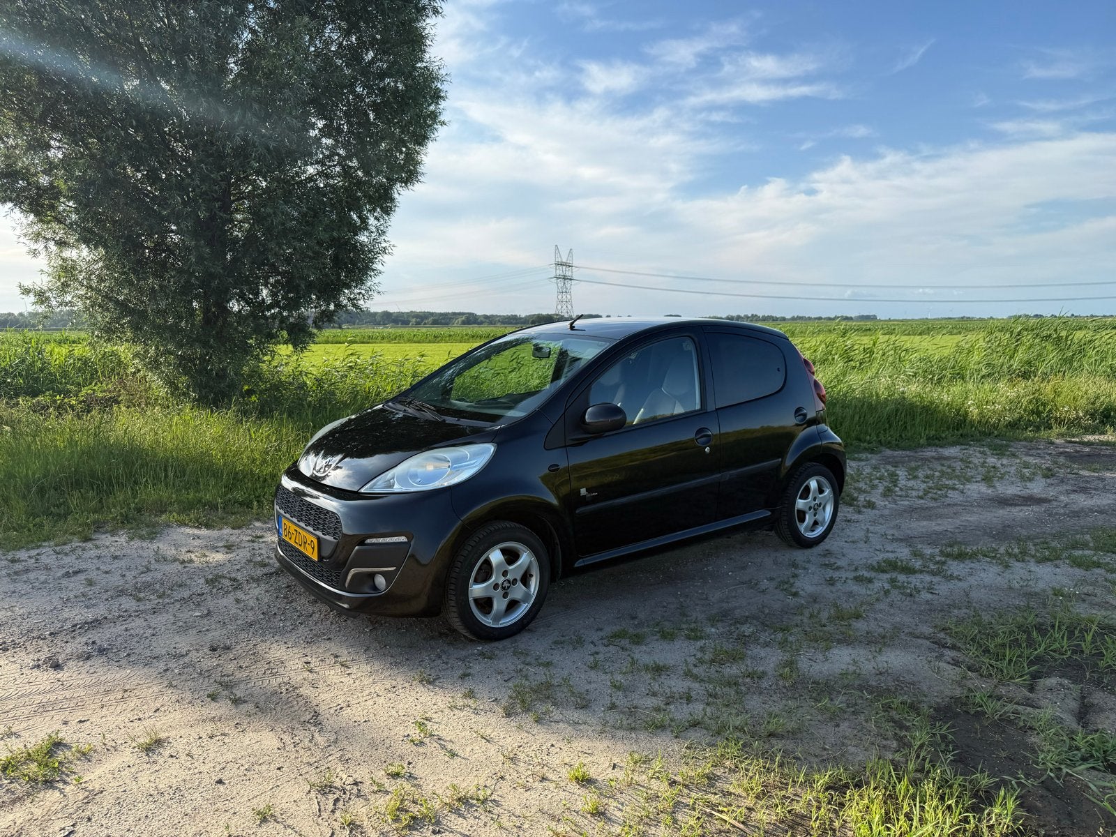Peugeot 107 1.0 12V 5DR 2012 Zwart, Voorwielaandrijving, Zwart, 4 stoelen, Origineel Nederlands